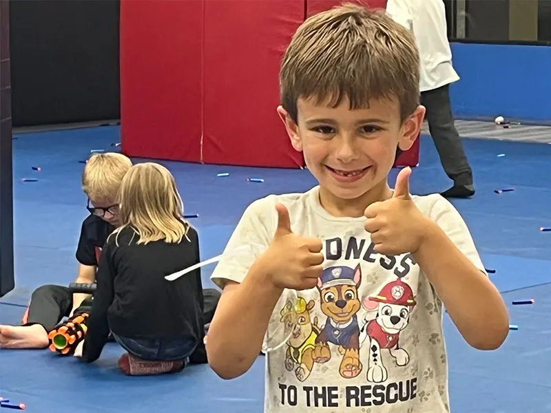 kids in Erlanger martial arts class improving focus, discipline, and listening skills through martial arts training